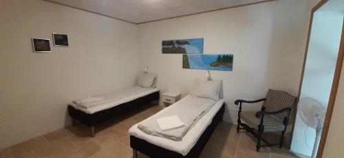 Posteľ alebo postele v izbe v ubytovaní Haramara