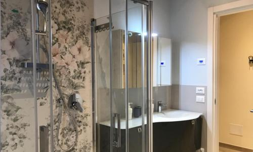 a bathroom with a shower and a sink at le scuderie di s.Bakhita in Schio