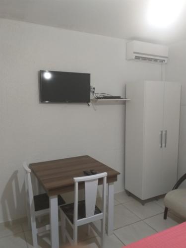TV tai viihdekeskus majoituspaikassa Rainha do Mar