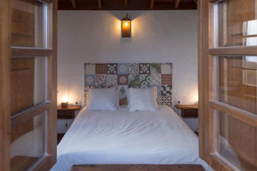 Llit o llits en una habitació de Casa El Llano