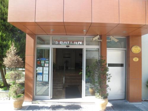 a building with the entrance to a bankamn at Hotel Baylan İzmir in Izmir