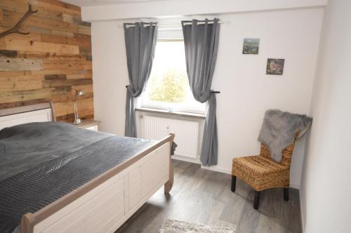 En eller flere senge i et værelse på Harzfeuer Bergblick