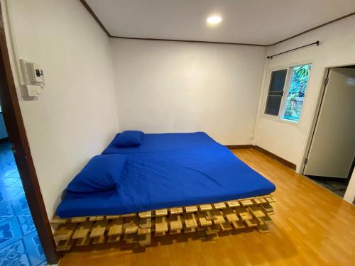 Łóżko lub łóżka w pokoju w obiekcie Dragon Home Lodge