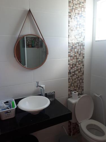 Ett badrum på Duplex Cabo frio I