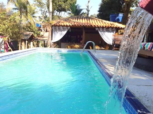 Het zwembad bij of vlak bij Pousada Flor de Pitaya