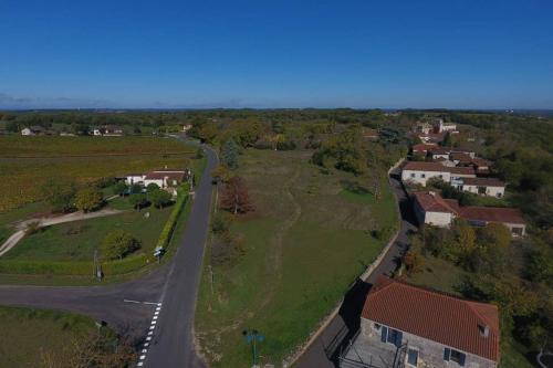 an overhead view of a road in a residential neighborhood at l'Empereur - La Maïsou in Sérignac