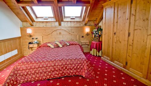 Postel nebo postele na pokoji v ubytování Albergo Valbella