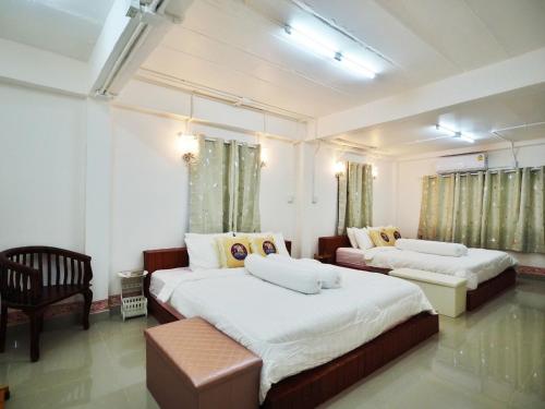Voodi või voodid majutusasutuse Doi Samoe Dao Hostel toas