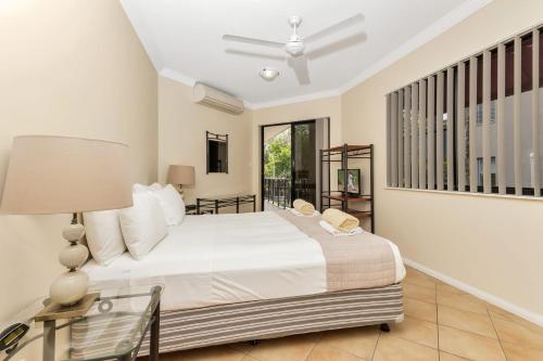 A bed or beds in a room at Mediterranean Beachfront Apartments