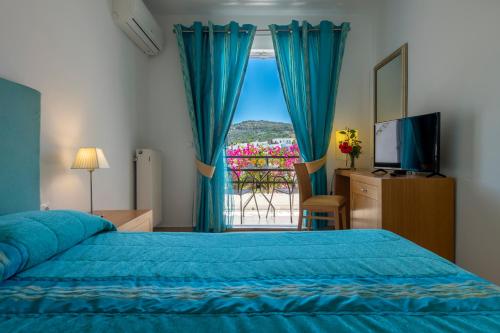 Postel nebo postele na pokoji v ubytování Skala Hotel