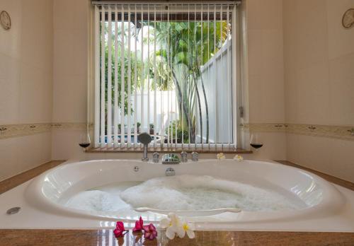 Ванна кімната в Village Austria Luxury Pool Villas