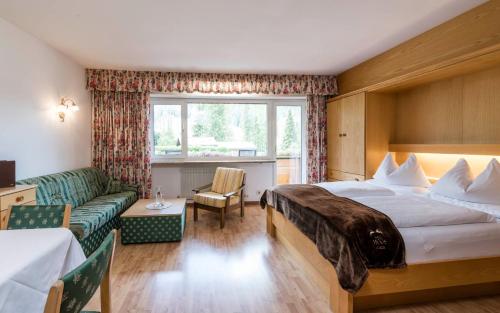 Postel nebo postele na pokoji v ubytování Residence Bad Moos