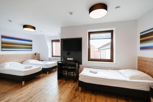 Säng eller sängar i ett rum på Horeka Hotel & SPA