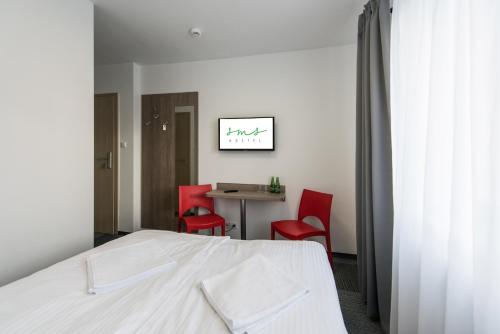 Ένα ή περισσότερα κρεβάτια σε δωμάτιο στο Hostel SMS FREE PARKING