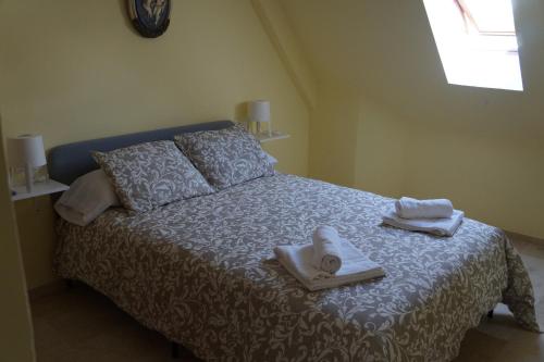 Postel nebo postele na pokoji v ubytování Apartamento Centro Pergo