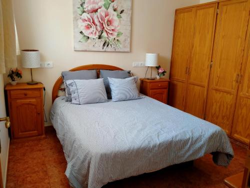 A bed or beds in a room at Martha`s Holiday Home