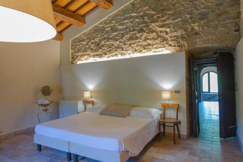 Posteľ alebo postele v izbe v ubytovaní Agriturismo Marcofrate, a Retreat in the Nature