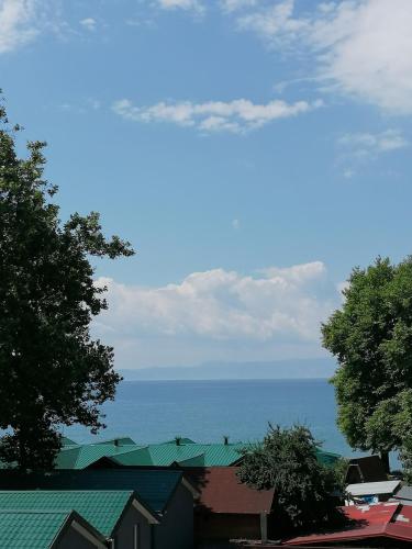 a view of the ocean from the roofs of houses at Villa Natali in Ohrid