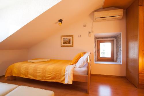 Apartments Villa Serventiにあるベッド