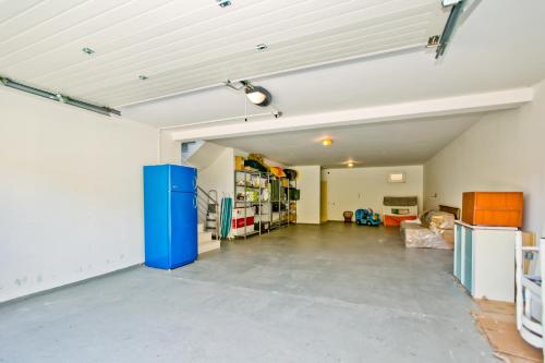 an empty garage with a large concrete floor at ISLAND HVAR LUXE Holiday Villa Maslina with Beach in Milna