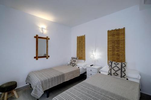Ένα ή περισσότερα κρεβάτια σε δωμάτιο στο Casita Bonita Old Town Marbella