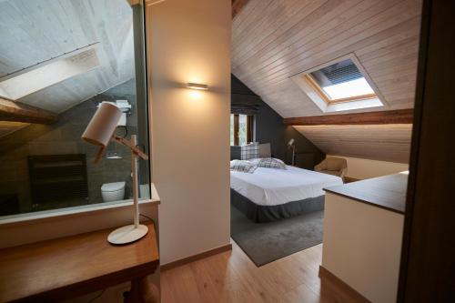 Ένα ή περισσότερα κρεβάτια σε δωμάτιο στο Hostal Lola