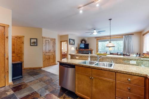 a kitchen with a sink and a counter top at Comfortable and Convenient Truckee Condo in Truckee