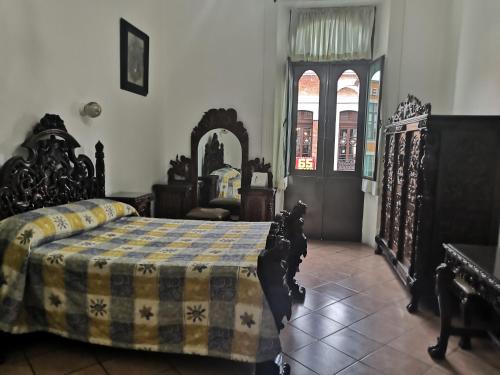 Postel nebo postele na pokoji v ubytování Hotel de los baños