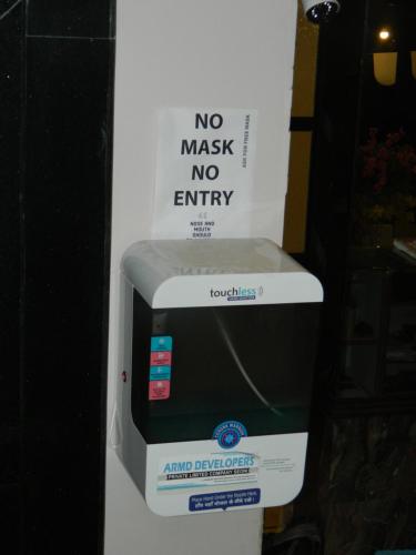 a no waste no entry sign on top of a machine at Shivani Palace Hotel, Restaurant & Party Hall in Seonī