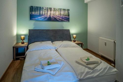 Postel nebo postele na pokoji v ubytování Hotel Birschel-Mühle