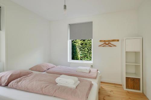 A bed or beds in a room at Vakantiewoning Seaewald