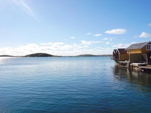 a view of a large body of water with houses at Seaside Serenity in Mollosund-By Traum in Mollösund
