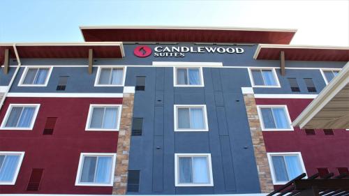 a building with a sign that reads campbellwood suites at Candlewood Suites Fargo South-Medical Center by IHG in Fargo