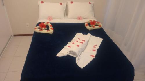 Cama ou camas em um quarto em Nannai Residence - Vila Garoupa