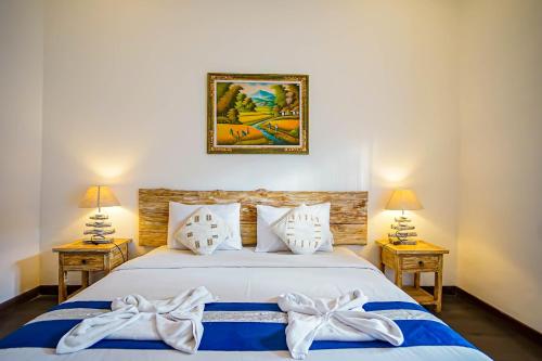 Cama ou camas em um quarto em Bali Manik Guest House Canggu