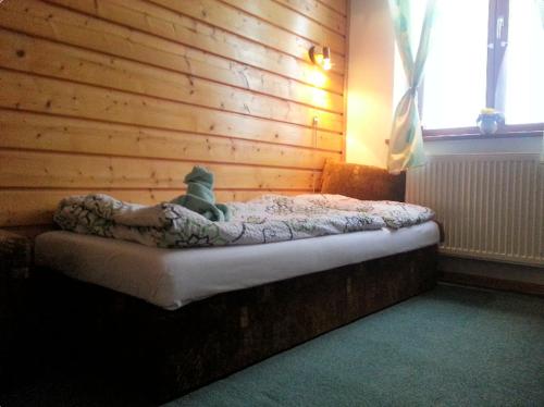 Postel nebo postele na pokoji v ubytování Rodinný penzion Ždiaran