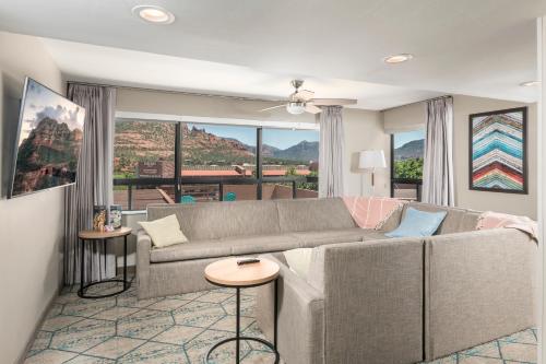 a living room with a couch and a table at Matterhorn Inn in Sedona
