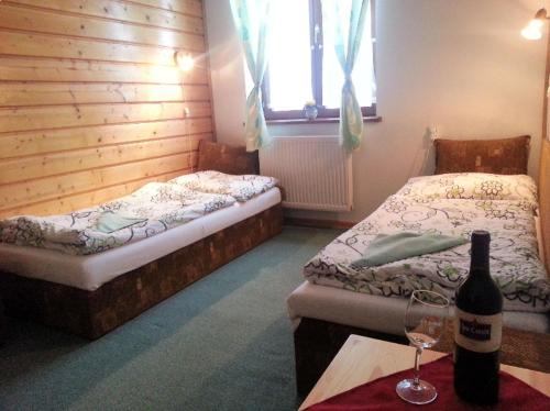 Кровать или кровати в номере Penzion Ždiaran