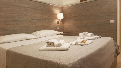 Katil atau katil-katil dalam bilik di Hotel La Baia