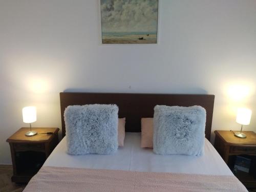 Ένα ή περισσότερα κρεβάτια σε δωμάτιο στο Ultracentral Apartments