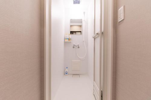 Kúpeľňa v ubytovaní SAMURAI STAY 黄金町-Male Only