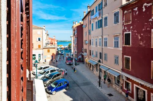 a view of a city street with cars parked at Nel Centro City Apartment in Rovinj