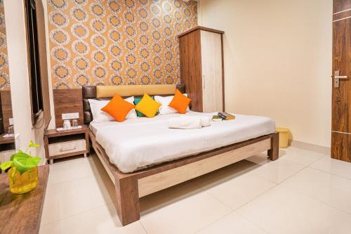 Krevet ili kreveti u jedinici u objektu goSTOPS Amritsar, Chatiwind Gate