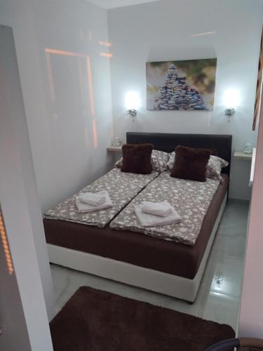 Postelja oz. postelje v sobi nastanitve Apartman Deluxe