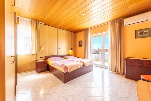 Ein Bett oder Betten in einem Zimmer der Unterkunft Studio Apartments Apolonia