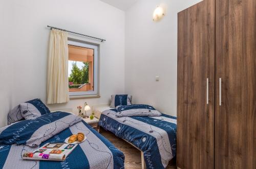 Säng eller sängar i ett rum på Villa Romana and Tea