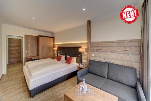 Postel nebo postele na pokoji v ubytování Hotel-Restaurant Früchtl
