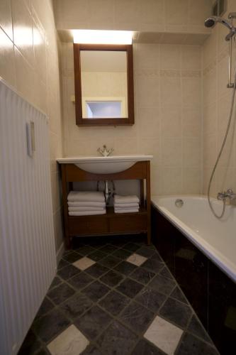 Ένα μπάνιο στο Appartement Caraibes 8ste verdieping