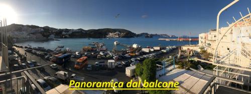 a view of a large body of water with cars parked at Porto di Ponza - Immobilevante in Ponza