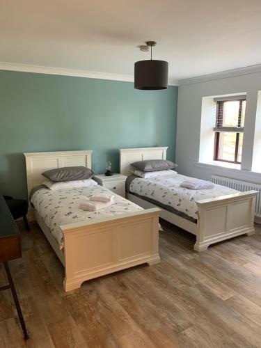 Katil atau katil-katil dalam bilik di Crawfield Grange
